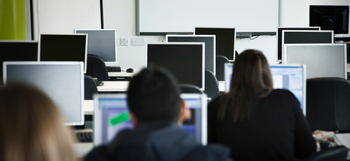 classroom with students and computers